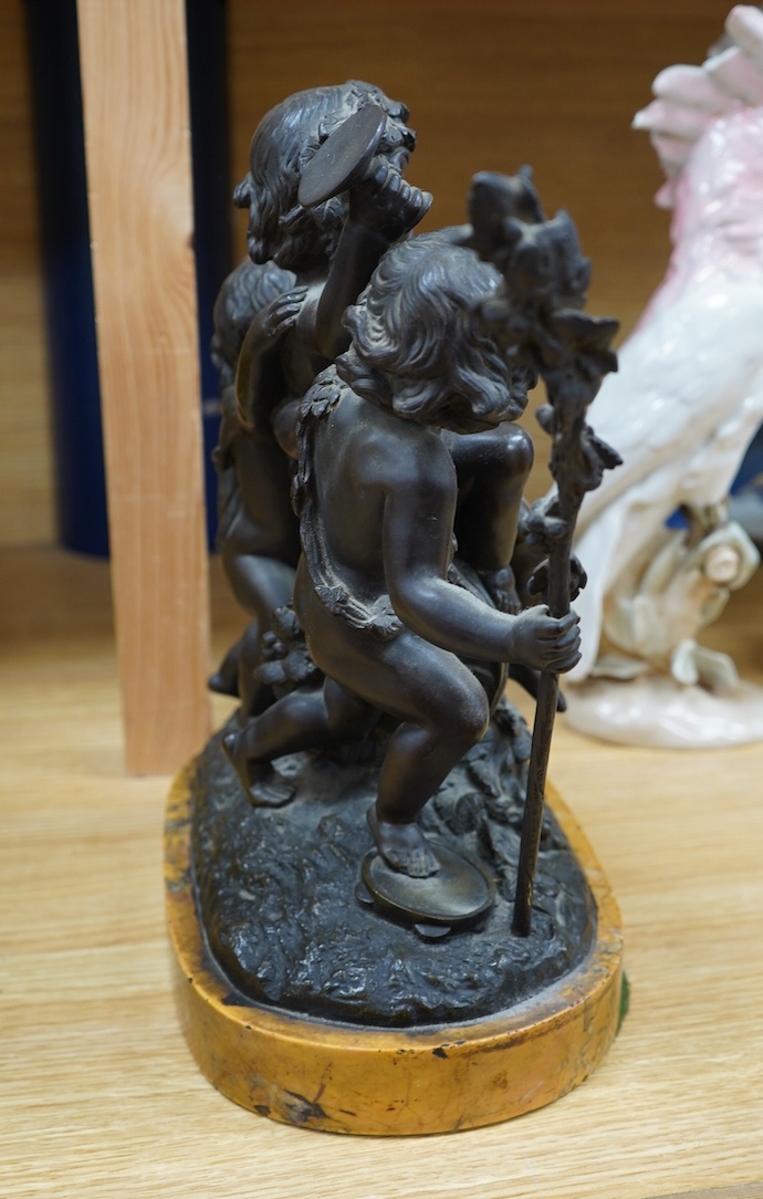 After Claude Michel Clodion (1738-1814), a bronze group of three Bacchanalian cherubs on sienna marble base, 31cm. Condition- fair to good